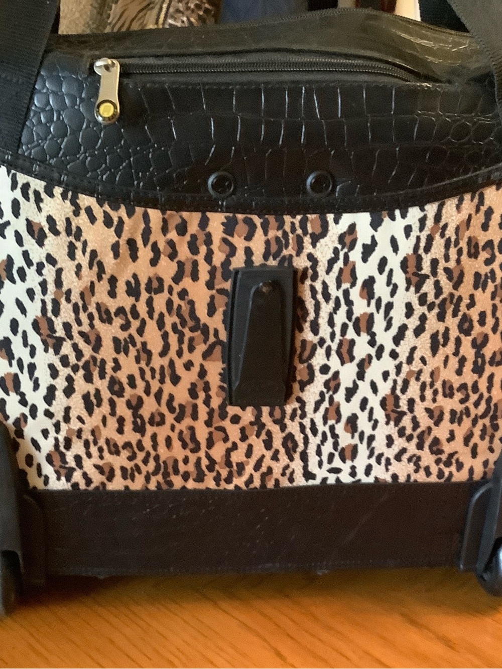 Olympia Leopard Print Travel Tote with wheels and adjustable pull handle. EUC